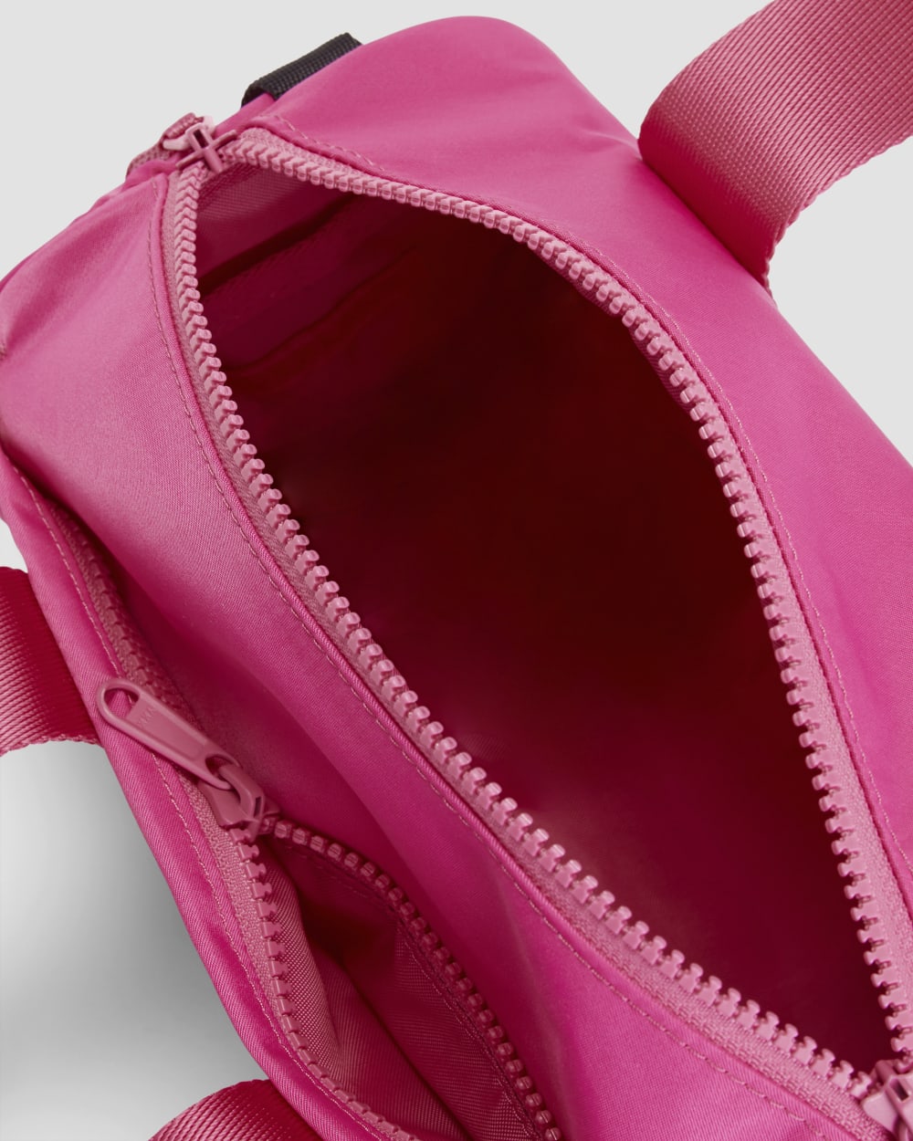 womens-recycled-nylon-crossbody-fuscia-pink