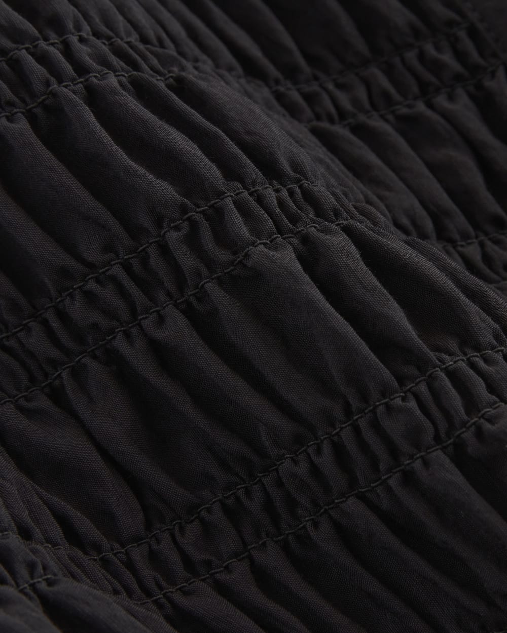 womens-smocked-cardigan-black