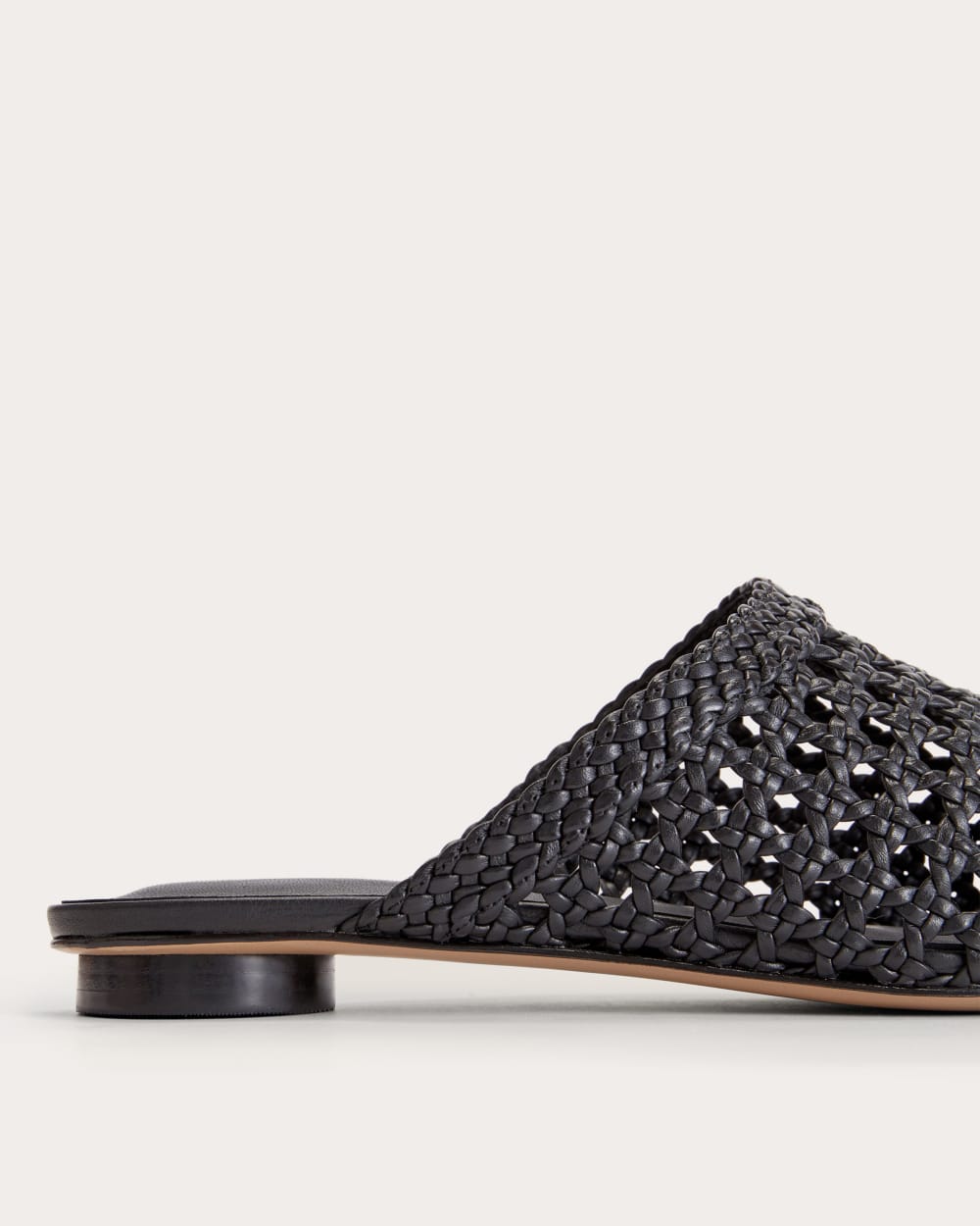 women-leather-day-mule-black-woven