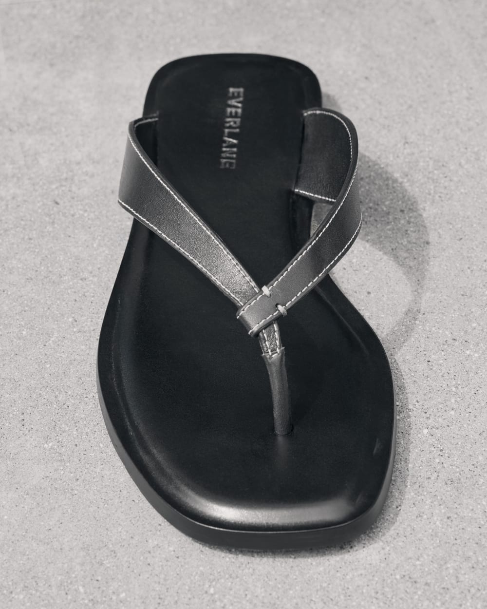 womens-leather-flip-flop-black | editorial