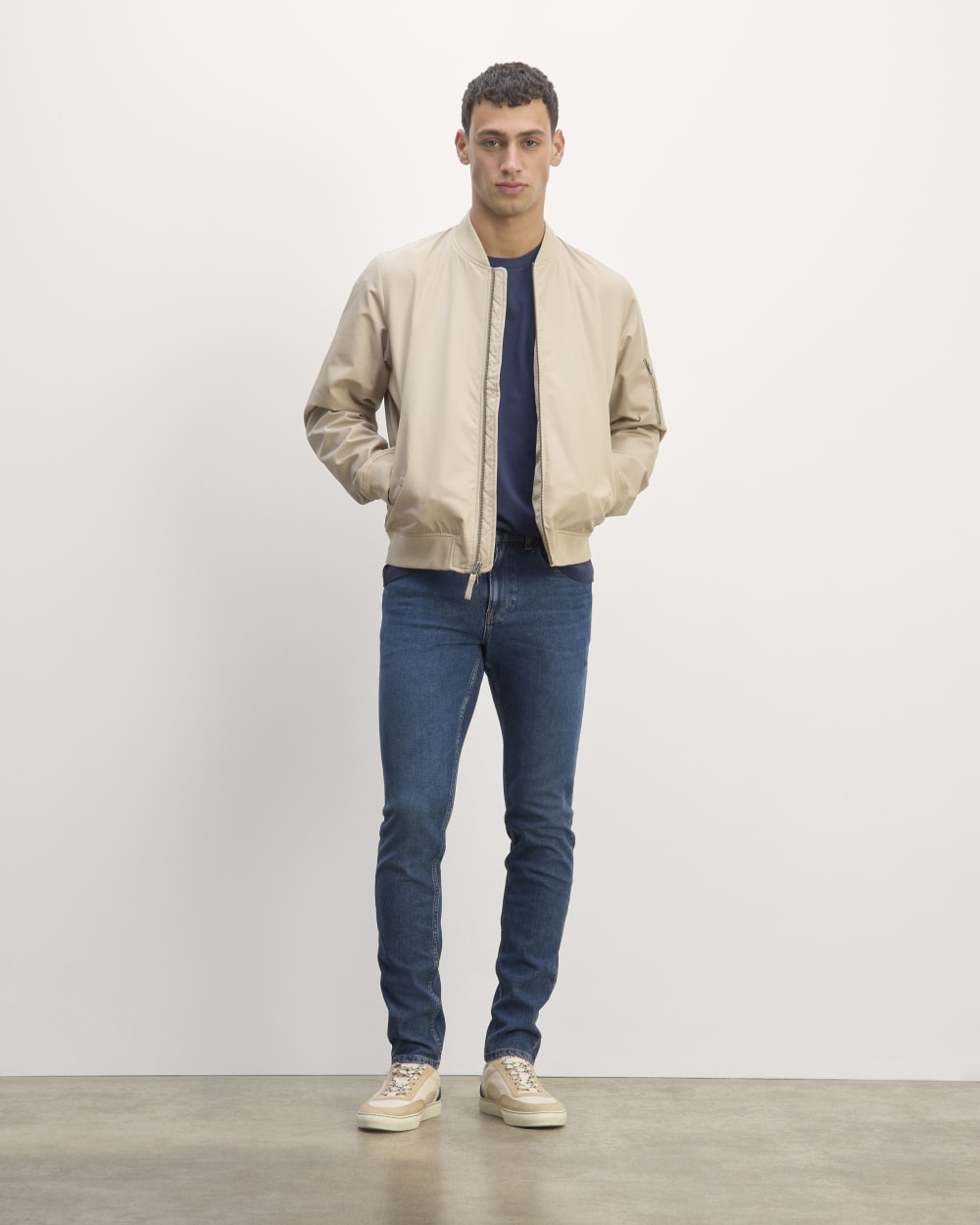 mens-uniform-performance-skinny-jean-med-indigo | primary