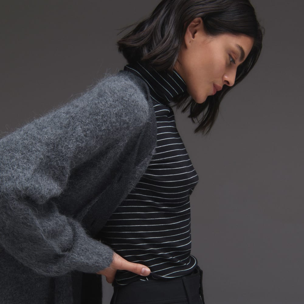 womens-supima-rib-turtleneck-black-canvas-tan