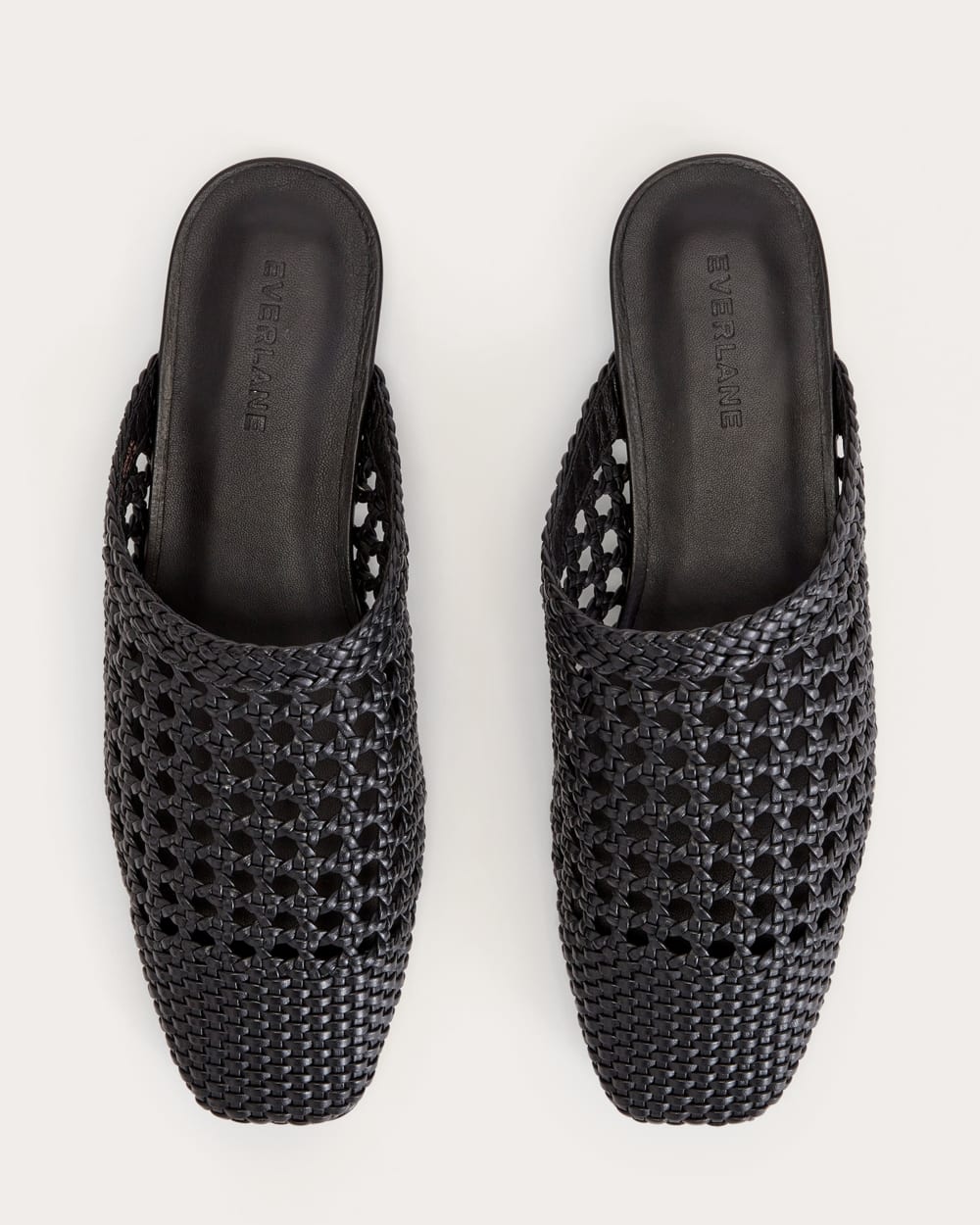 women-leather-day-mule-black-woven