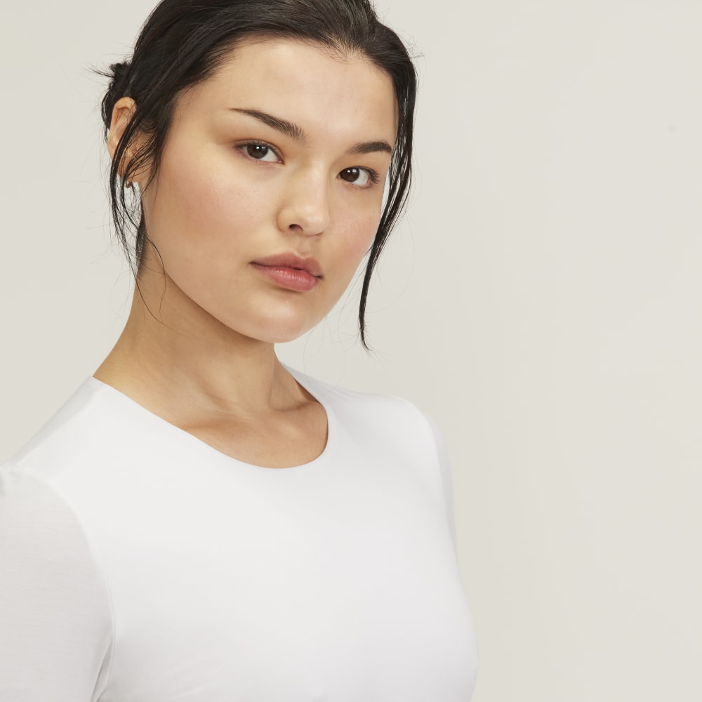 EUCHRONIA bodysuitホワイト White Elegance Bodysuit Shorts – Embody Confidence