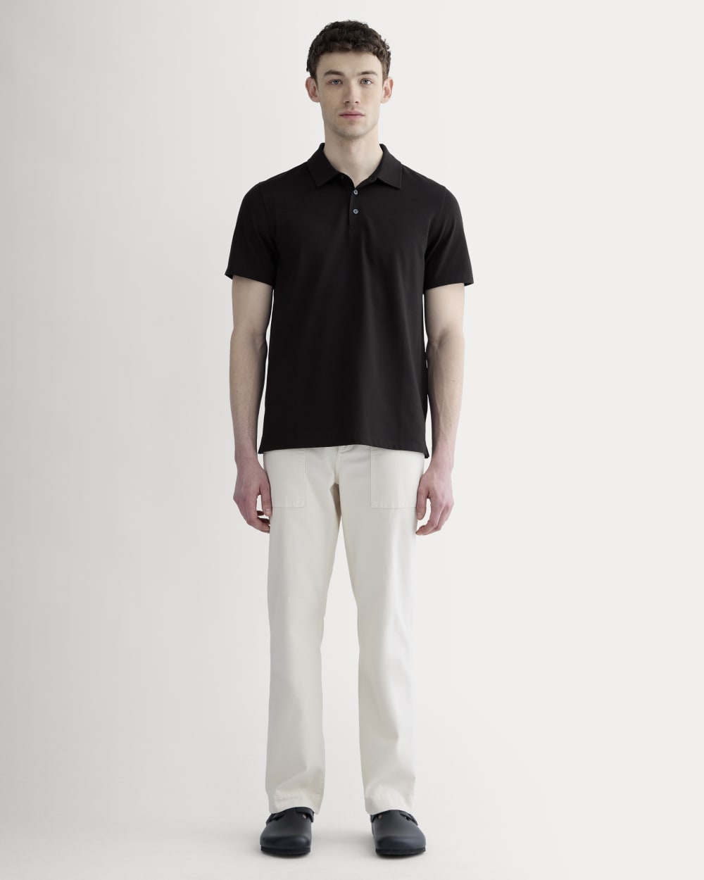 black dress pants and polo shirt Black Polo Shirt with with Black Micropattern Pants