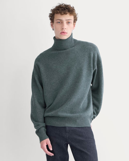 mens-luxe-merino-relaxed-turtleneck-heather-midnight-navy | primary