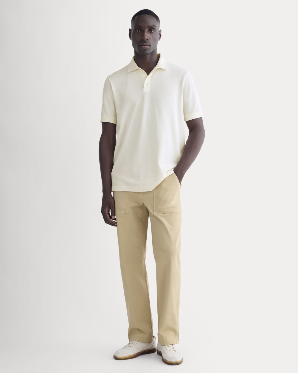 polo with dress pants Light Blue T-shirt, Off-White Pants, Black Moccasins Performance Poly Stretch Fabric Tailored Fit Moisture Wicking Wrinkle Free Cooling Tech Quick Polo And Dress Pants Outfit