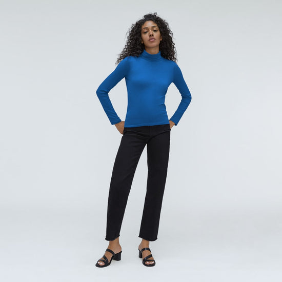 Sapphire blue turtleneck with black jeans