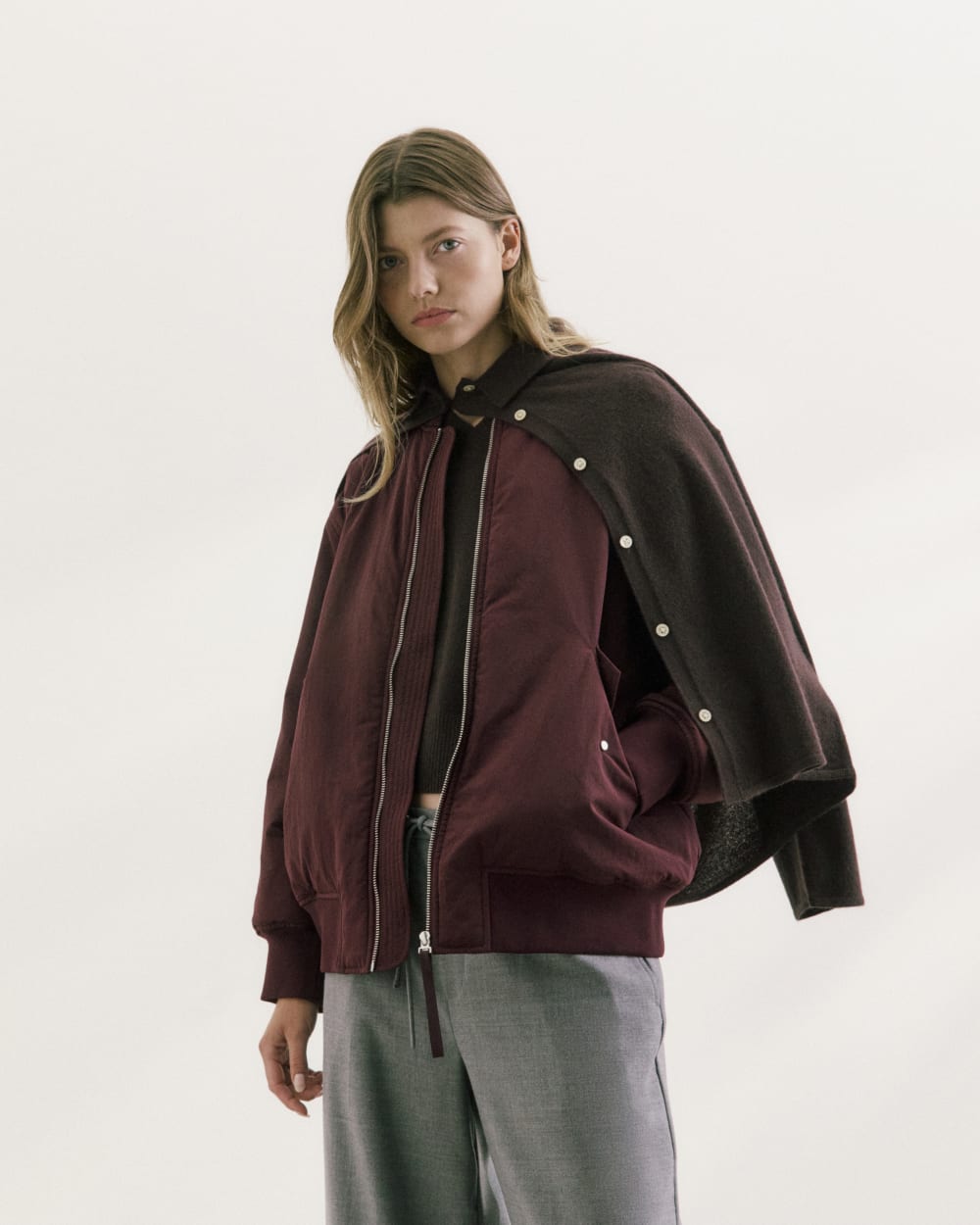 womens-renew-oversized-puffer-bomber-deep-plum | editorial