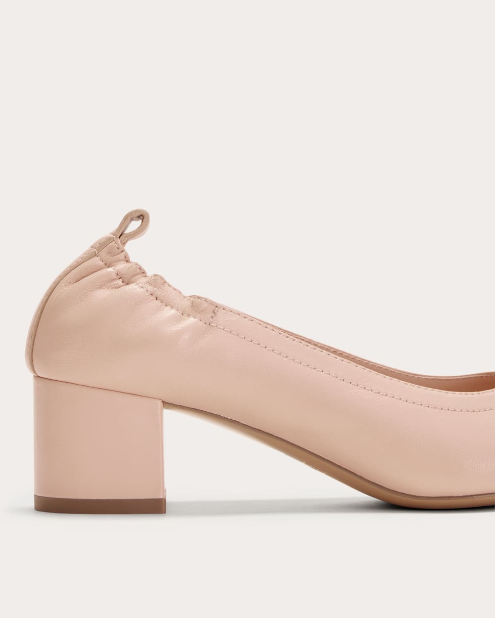 brown dress pink heels Soft pink meets chocolate brown for the perfect Valentines palette A light pink dress layered with brown tights, beige heels, and a brown bag creates a warm, elegant vibe effortless yet polished.