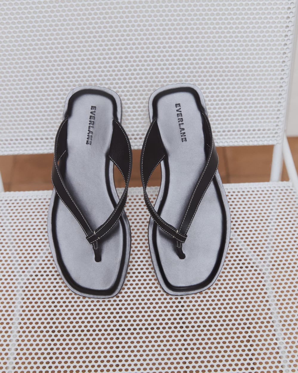womens-leather-flip-flop-black | editorial