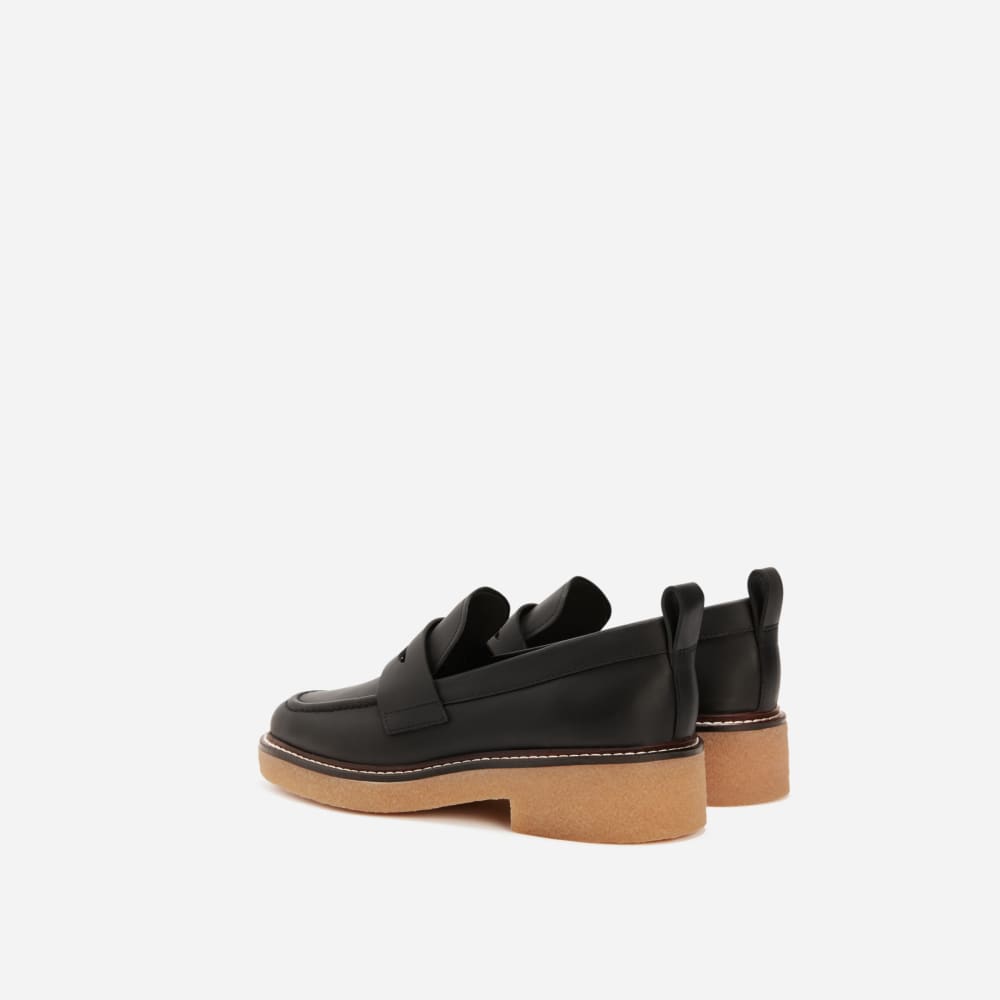 womens-gum-sole-penny-loafer-black