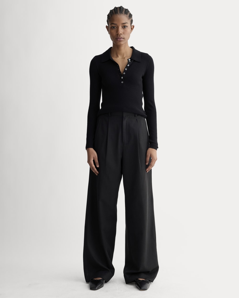 The Polo in Ultrasoft Merino Black – Everlane