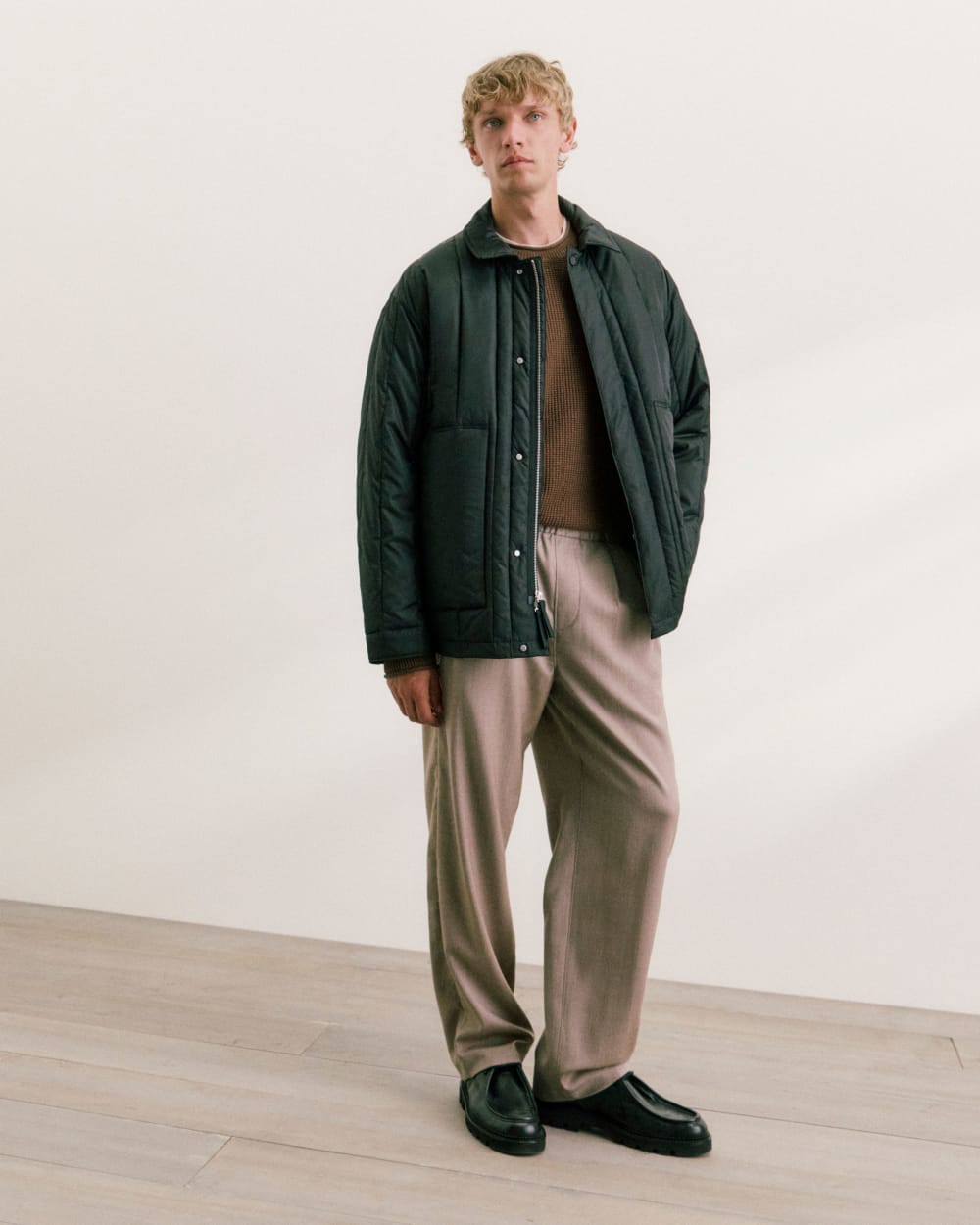 mens-renew-vertical-quilted-jacket-black | editorial