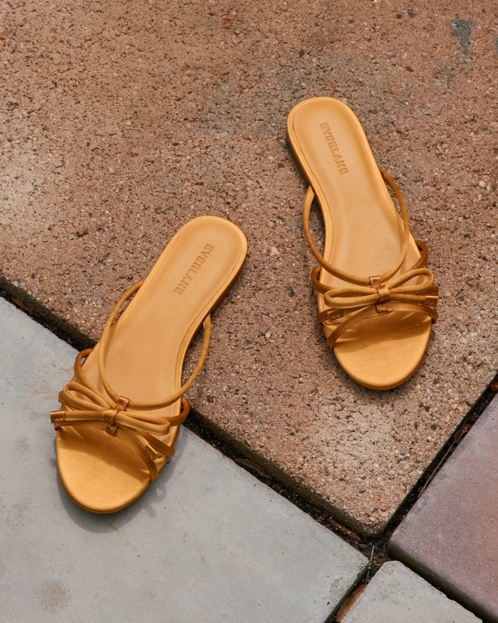 womens-leather-bow-sandal-golden-sun-satin
